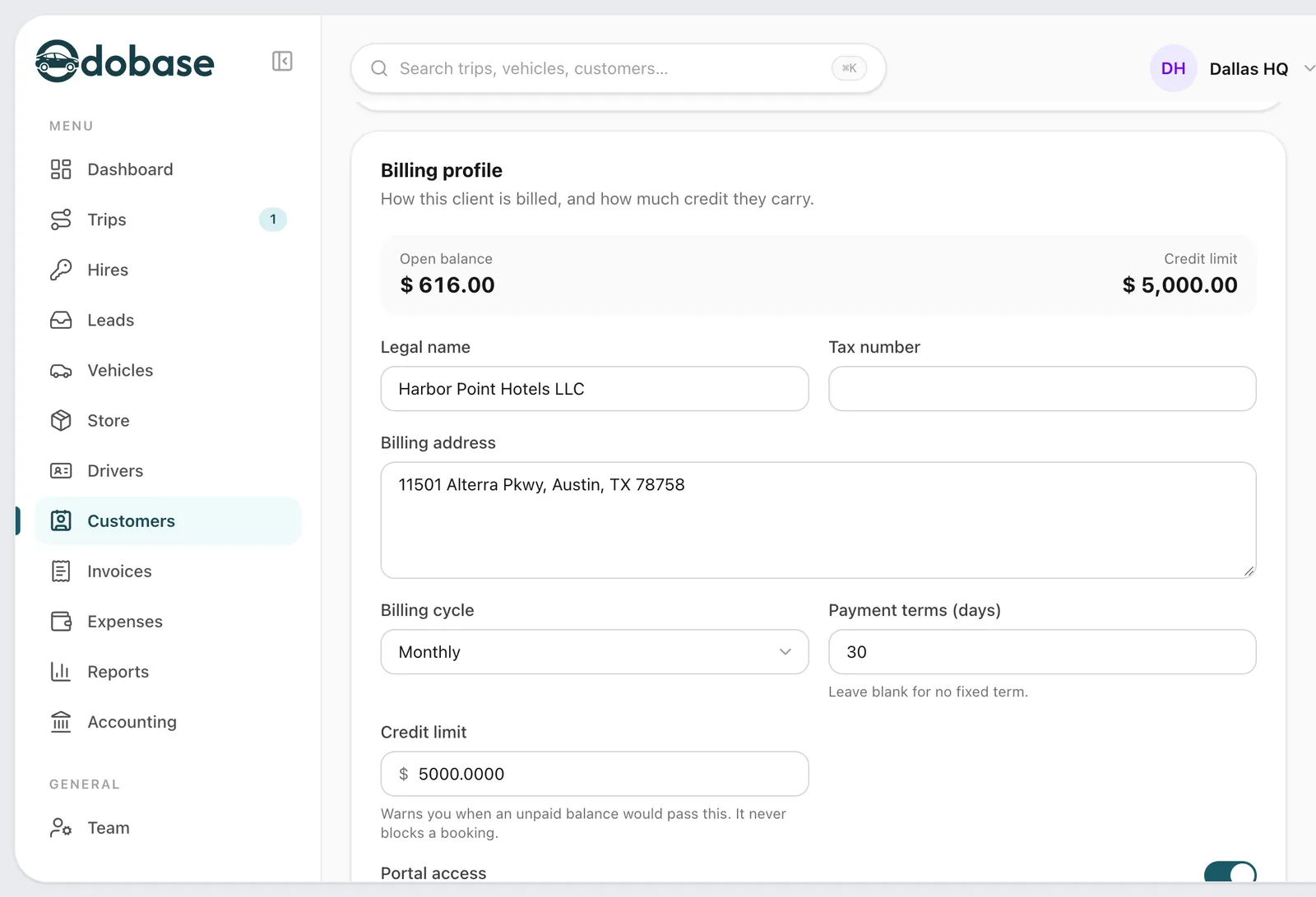 A corporate client's billing profile: open balance and credit limit, legal name, billing address, a monthly billing cycle with 30-day terms, and the portal access switch.